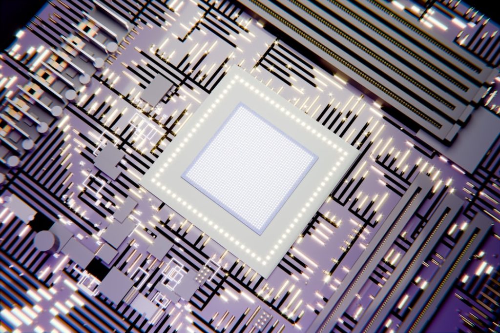 A glowing square microchip on a futuristic circuit board.