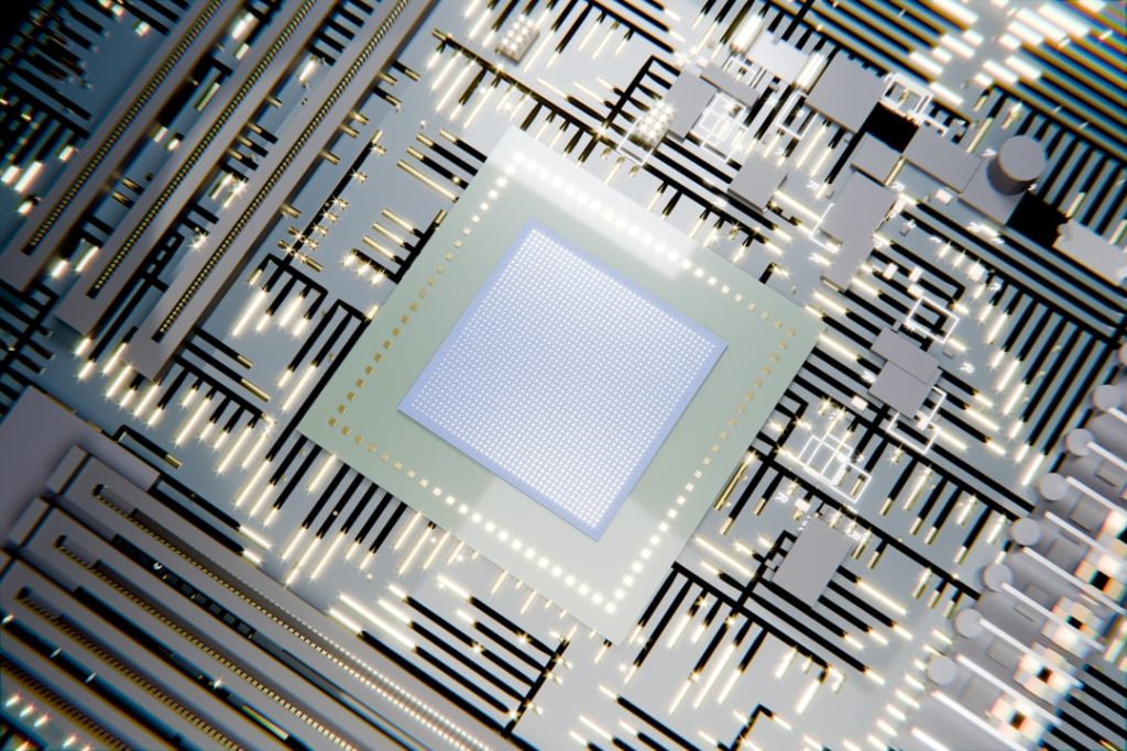 A glowing microchip on a circuit board with light patterns